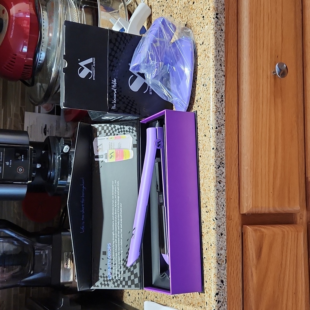 Purple Bionic Pro Ceramic flat iron with matching holder